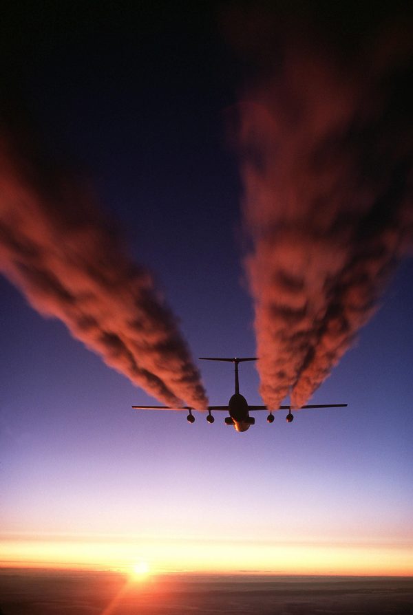 C-141 Starlifter at Sunset – Military Cargo Plane Poster, Aviation Art, Sunset Contrails, Airlift Command Decor, Transport Aircraft Print